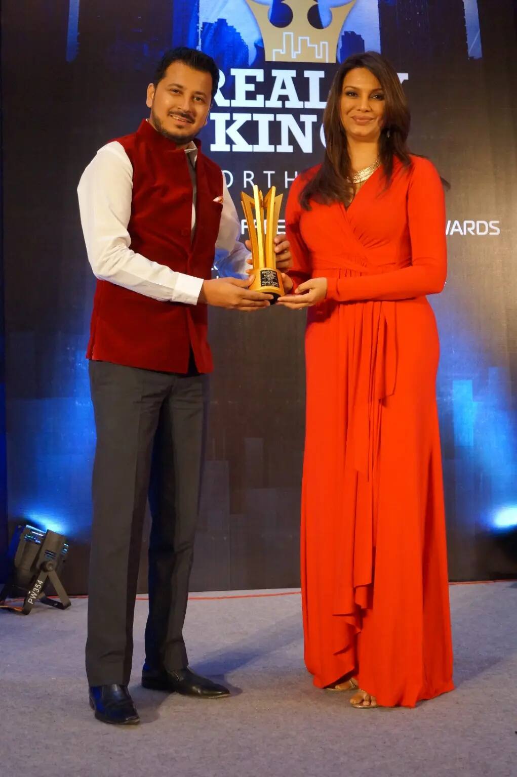 Tushar Kumar receiving the Realty King Award in Delhi NCR