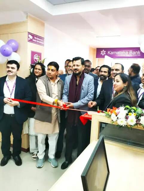 Tushar Kumar cutting the ribbon at the inauguration of a Karnataka Bank Limited branch